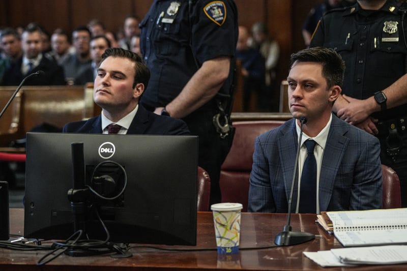 NYPD officers Michael Caligiuri, 31, and Ryan McLoughlin, 30, were arraigned on Friday for allegedly covering up a drunk driving crash involving another officer.