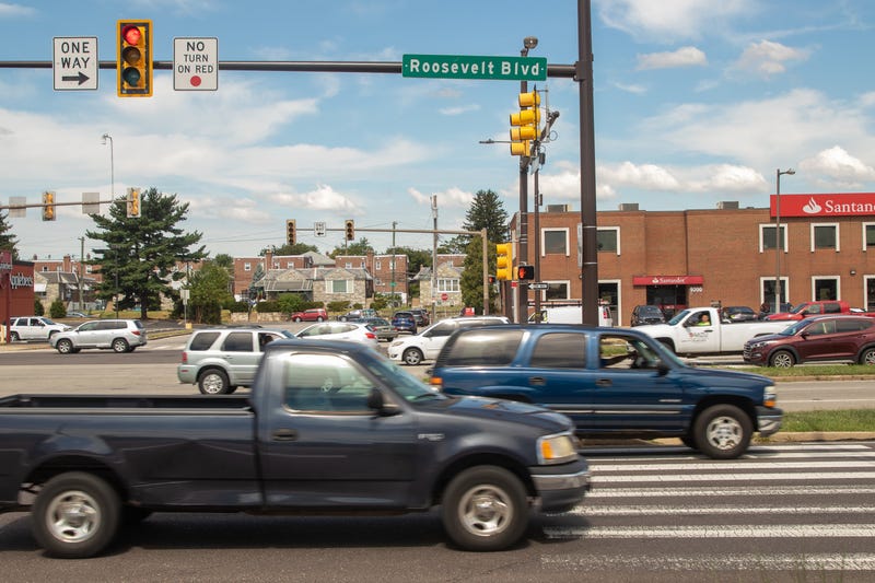cars drive by on Roosevelt Boulevard