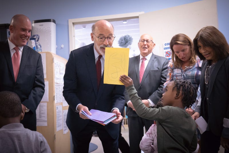 Pennsylvania Gov. Tom Wolf receives a card from a Kiddie Space Heights student in Wilkes-Barre on Sept. 29, 2022. Wolf visited Kiddie Space Heights with Department of Human Services Acting Secretary Meg Snead to spotlight his $25 million child care tax credit program that will give back $180 to $630 to Pennsylvania's working families with young children. About 220,000 families are expected to benefit from the program.