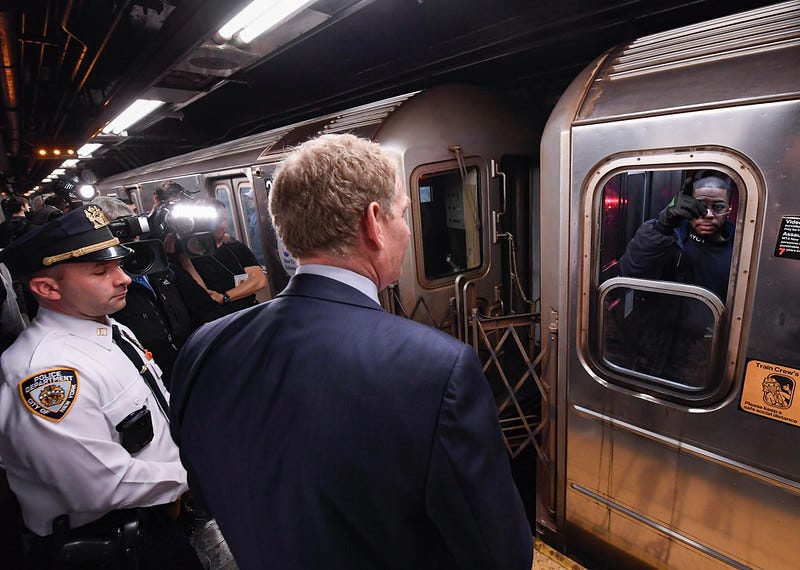 Janno Lieber and 6 train conductor.