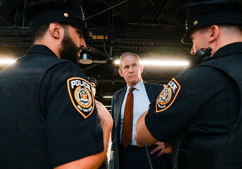 Janno Lieber with MTA police officers.