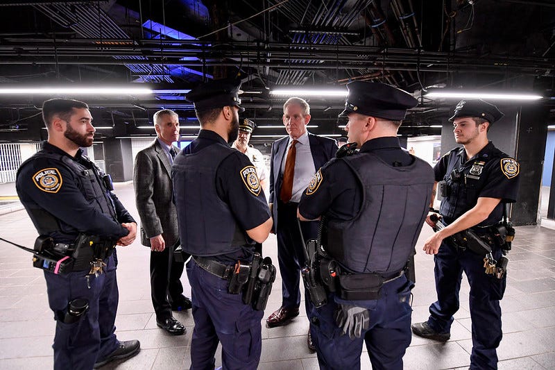 Janno Lieber and MTA police officers.