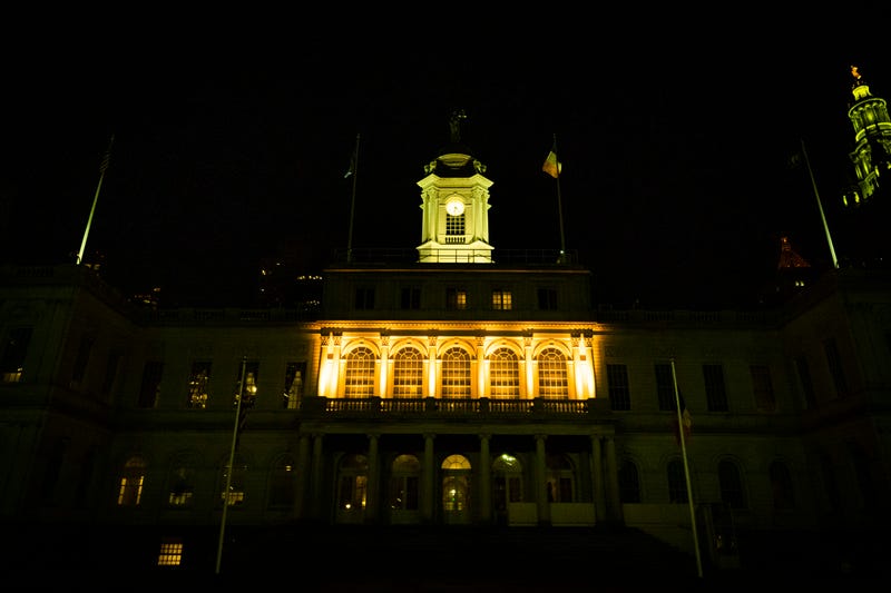 City Hall lit yellow in honor of International Holocaust Remembrance Day on January 27, 2023. The building and others will be illuminated yellow Monday night for the Oct. 7 anniversary