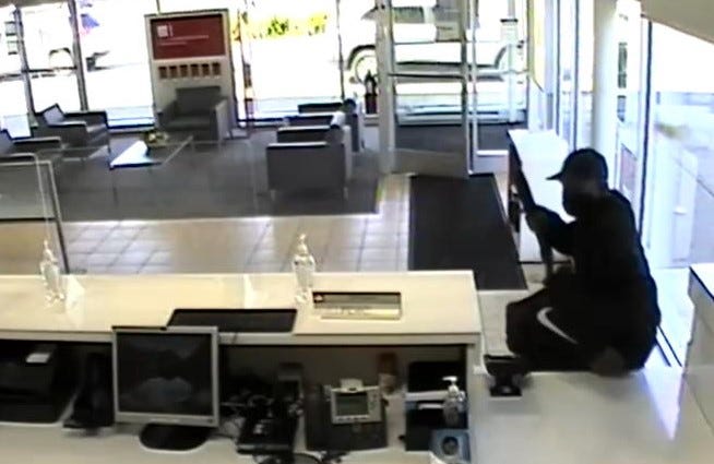 Authorities seek the public's help in identifying the man who robbed a Santander Bank at gunpoint on May 27, 2021, in Wyncote.
