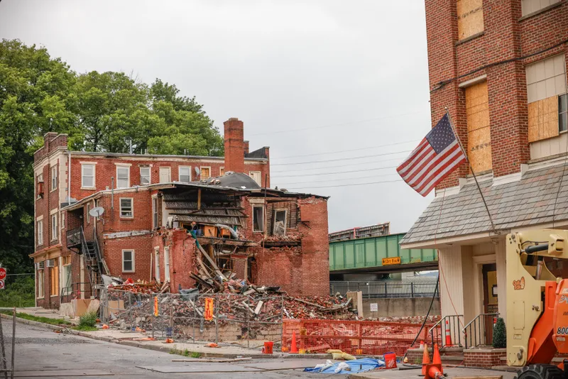 Pennsylvania Gov. Josh Shapiro, first responders, and state and local officials visit the site of the West Reading chocolate factory explosion on July 10, 2023.