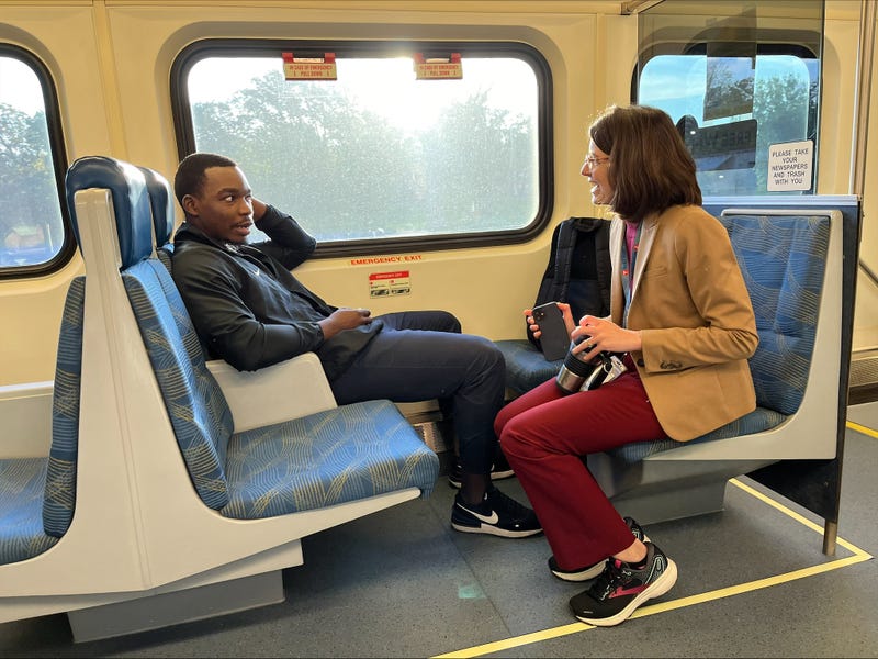 Metro Transit General Manager Leslie Kanderas (R) who did some ride alongs in 2023 to learn what works and what doesn't work for riders. The agency is reporting an increase in ridership and decrease in crime compared to 2023. 