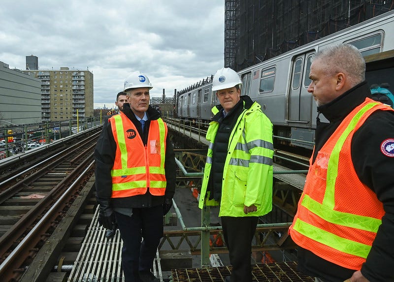 MTA Chief Safety Officer Patrick Warren and NYCT President Richard Davey at the scene of a derailed F train near the Neptune Avenue station on Wednesday.