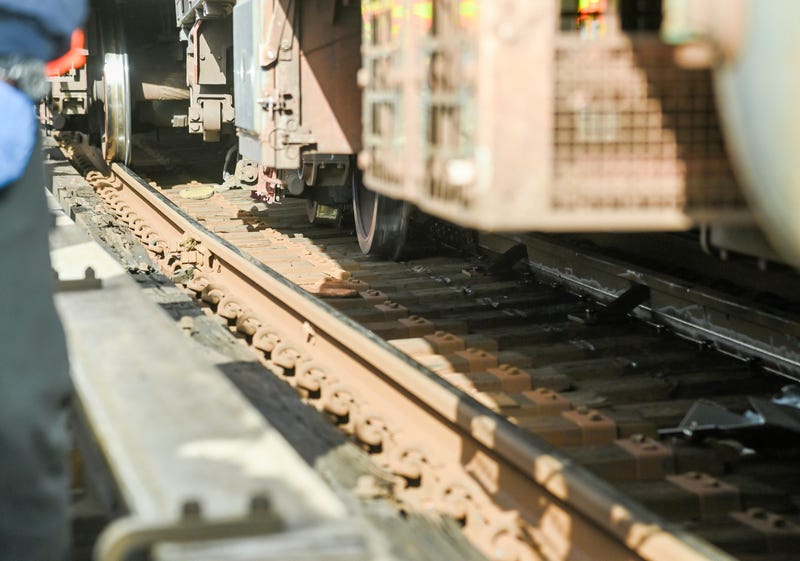 The wheels of a derailed F train are seen on Jan. 10, 2024