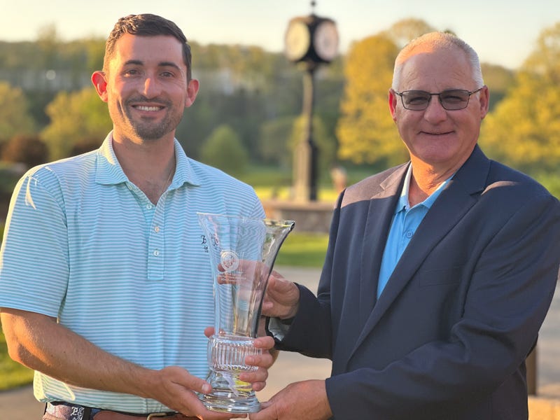 Handing over a trophy