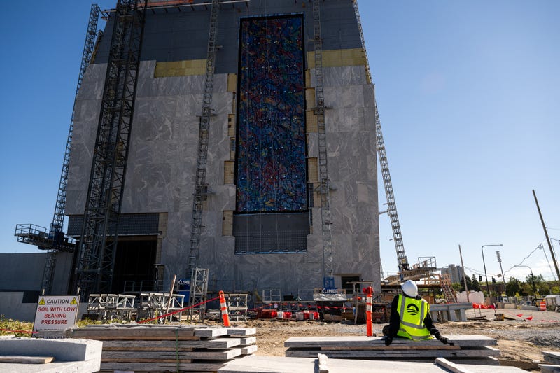 “Uprising of the Sun,” an 83-foot-by-25-foot stained glass piece, has been installed at the future Obama Presidential Center Museum site in Chicago.