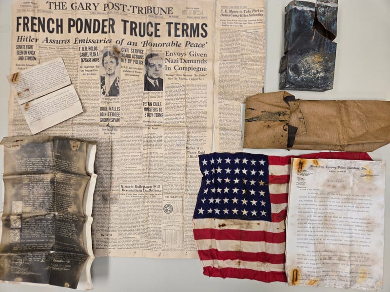 Items found within a time capsule by construction workers at the Indiana Dunes National Park.