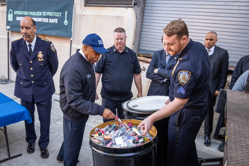 Mayor Eric Adams, New York City Sheriff Anthony Miranda and New York City Police Department (NYPD) Interim Commissioner Thomas G. Donlon celebrate the transportation of more than 1,200 pounds of illegal vape products out of New York City as they are shipped off for destruction. Pearson Warehouse, Long Island City.