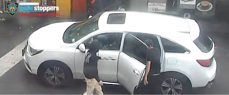 Police are searching for a white Acura SUV in the attack