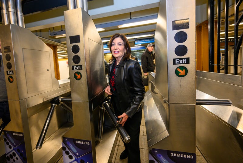 Governor Kathy Hochul rides public transit to and from a congestion pricing rally on March 21, 2025
