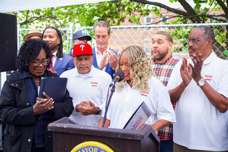 North 52nd Street in West Philadelphia has been restored to a vibrant commercial corridor thanks to a community-led effort to rid the area of drug dealers. City officials, including City Councilmember Jamie Gauthier (podium), celebrated the transformation on Aug. 21, 2025.