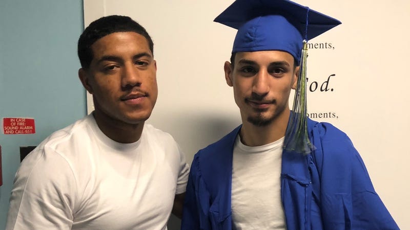 Chris Fitzgerald and Juan Marrero, his cousin who he helped encourage to get his high school diploma.