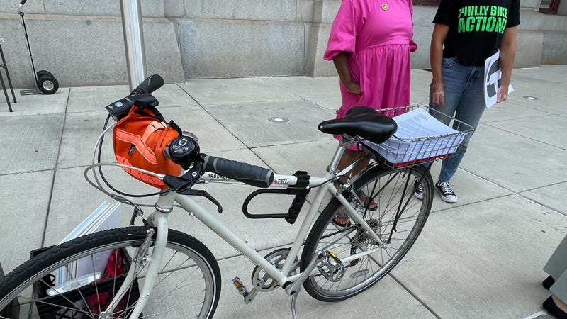 Bicycle safety advocates delivered a stack of close to 10,000 petitions and personal anecdotes to City Hall on Thursday afternoon, demanding that the mayor and City Council take action on protected bike lanes.