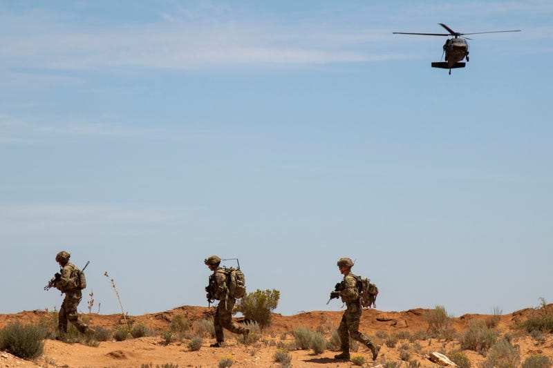 Soldiers assigned to 1st Platoon, D Company, 1st Battalion, 178th Infantry Regiment, Illinois National Guard clear the landing zone for a UH-60 Blackhawk as they prepare to leave the site of their fly-to-advise training mission at McGregor Range Complex, N.M., August 24, 2019. Security for advisement missions will be one of 178th’s top priorities during their upcoming deployment to the middle-east. (U.S. Army photo by Staff Sgt. Timothy Gray, 5th Armored Brigade)