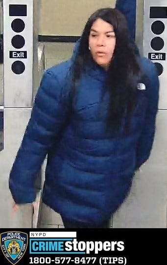 One of 11 suspects wanted in back-to-back robberies at the North Face store in SoHo last month.