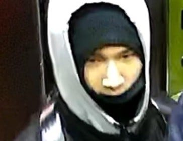 One of the suspects captured on surveillance camera