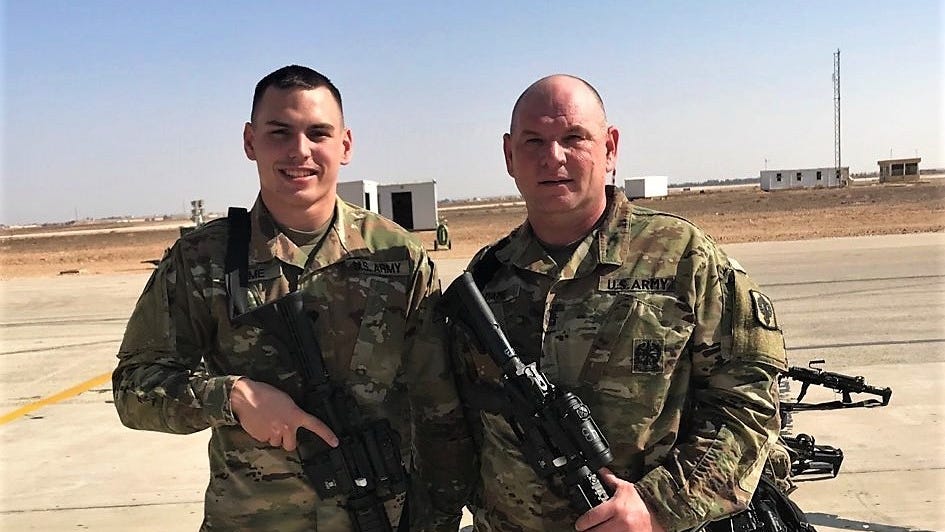Father and son serve overseas with 130th Field Artillery Brigade, Kansas Army National Guard