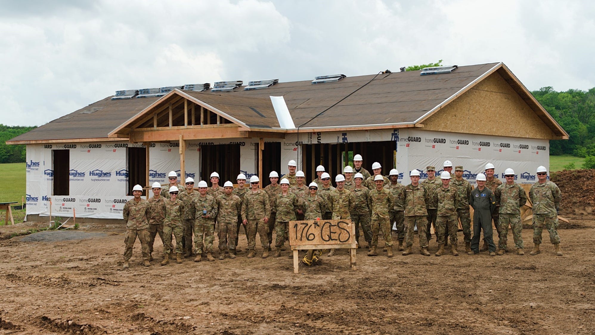 Alaska Air Guardsmen build homes for Cherokee veterans