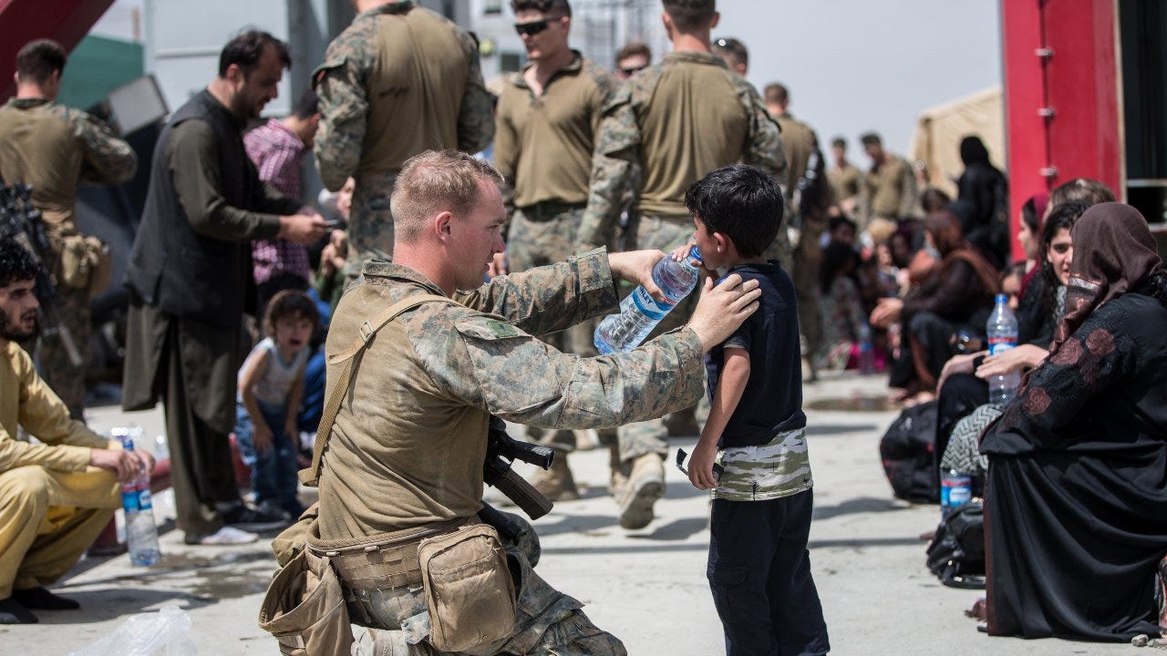 GALLERY: Remarkable photos show U.S. military helping Afghan evacuation