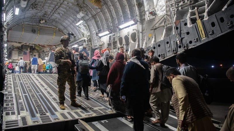 US troops surge evacuations out of Kabul but threats persist