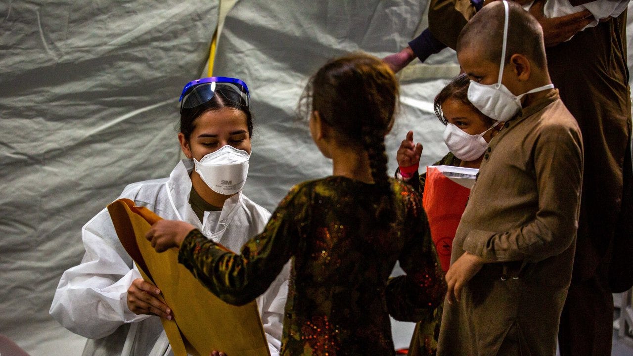 Air Force medics welcome Afghan evacuees, provide medical support