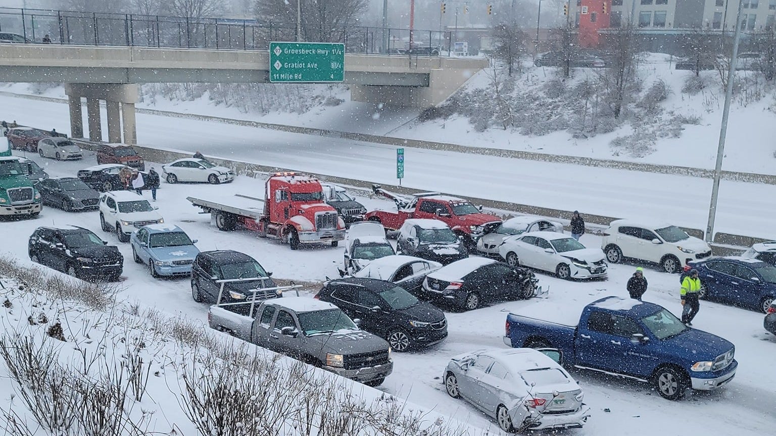 Multi-car pile-ups shut down I-696 and I-96; Police say drivers going "too fast" in snow