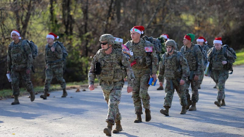 Victory Corps soldiers march to deliver holiday cheer