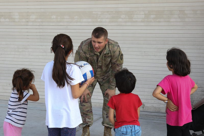 Fist bumps all the rage among Afghan children