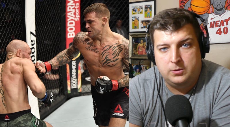 Dustin Poirier punches Conor McGregor of Ireland in a lightweight fight during the UFC 257