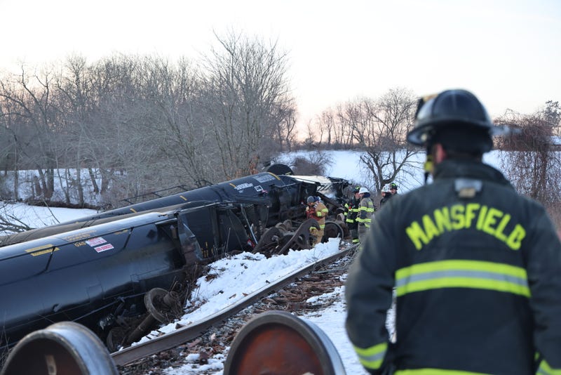 Freight train cars lie on their sides after a derailment in Mansfield, CT, 2/5/26