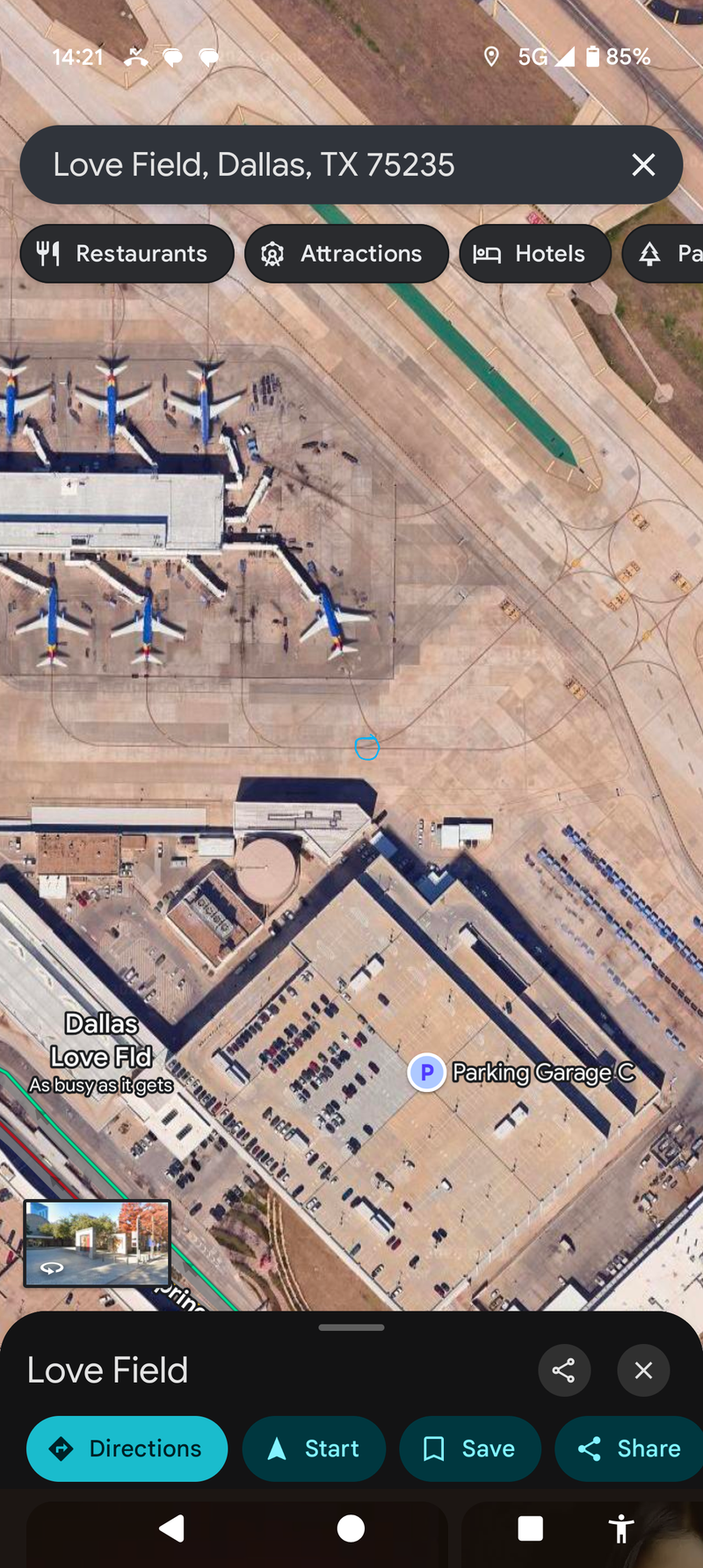 The blue circle marks where on the tarmac the plaque is embedded