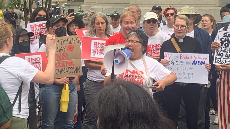 Debbie Wei with the Save Chinatown Coalition leads protesters opposed to the 76ers' Center City arena proposal, in Dilworth Park outside of Philadelphia City Hall, on Sept. 18. 