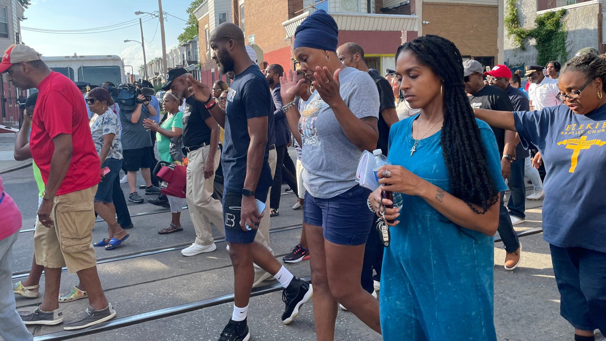 Prayer walk carries hope, support for stunned Kingsessing community