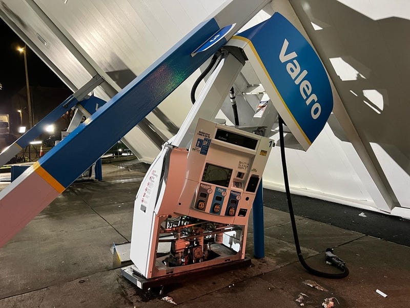 A Valero gas station in South San Francisco is closed after rain and intense winds blew the canopy over onto two gas pumps.