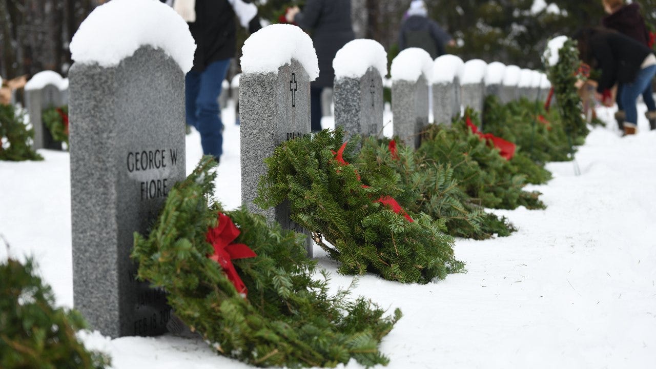 NY Air Guard commander salutes veterans at Christmas wreaths cemetery event