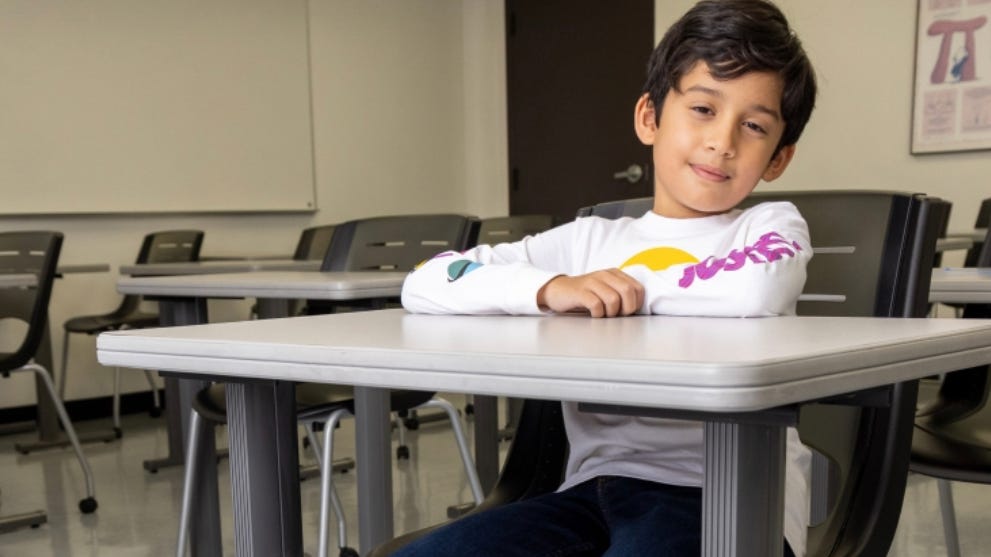 Boy, 12, graduates from Joliet Junior College with Internet Technology degree