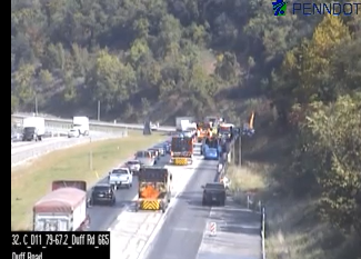 Crews cleaning up an early fatal accident on I-79