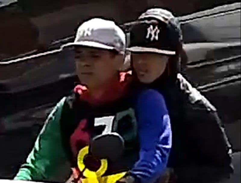 A photo shows two suspects being sought in a pair of moped robberies in Brooklyn this week
