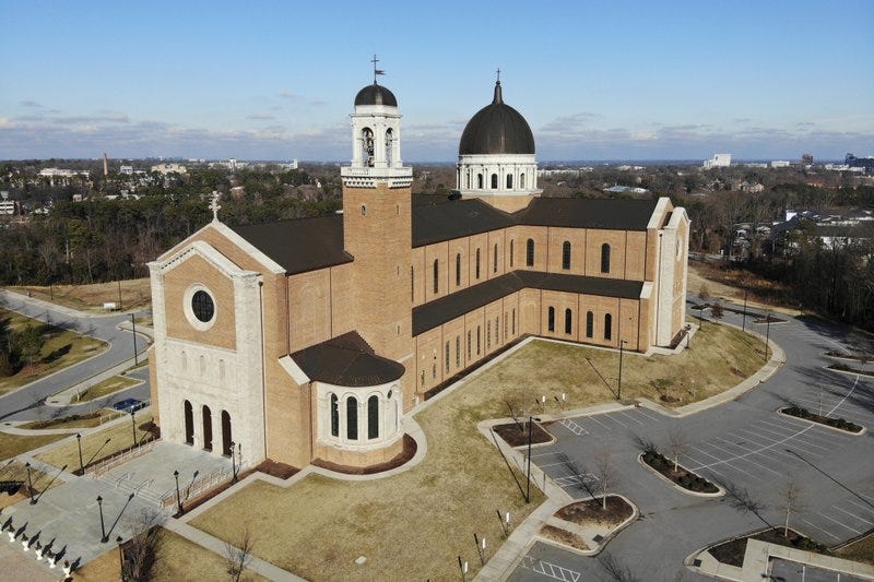 This Wednesday, Jan. 27, 2021, photo shows the Holy Name of Jesus Cathedral in Raleigh, N.C. So far, Congress has committed nearly $1 trillion in relief. An Associated Press investigation found that the Roman Catholic Church, one of the world’s largest institutions, was perhaps the biggest beneficiary.