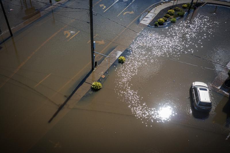 This photo from Thursday Sept. 2, 2021, shows Hurricane Ida rainfall flooding Mix Street near Farmington Avenue in Bristol, Conn. Gov. Ned Lamont has submitted a request to the Biden administration for a major disaster declaration, seeking federal funds to help Connecticut recover from damage caused by the remnants of Hurricane Ida.