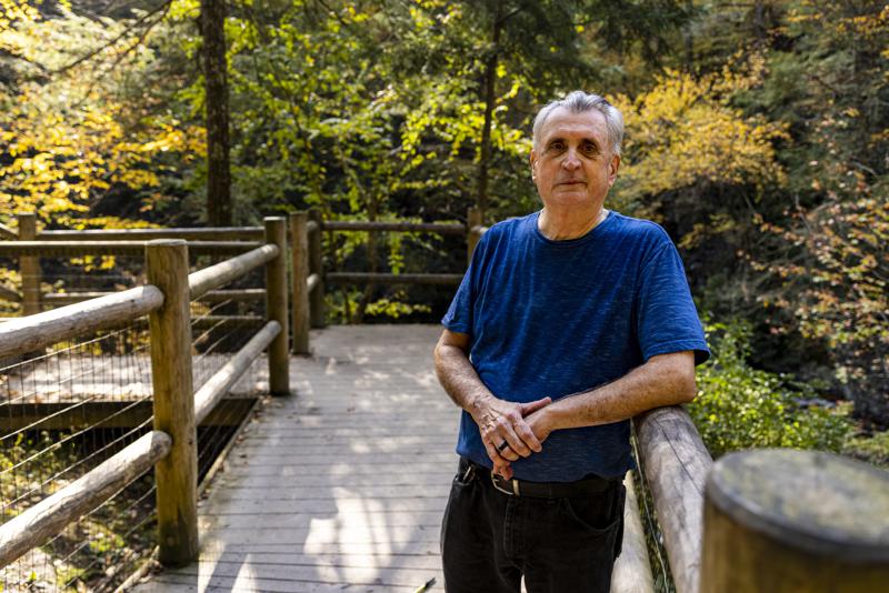 John Donahue, 68, of Dingmans Ferry, Pa., Environmental Consultant and a retired National Park Super Intendant, poses for a portrait near the Raymondskill Falls at the Delaware Water Gap in Milford, Pa., on Friday, Oct. 15, 2021.