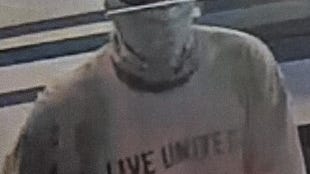 Bridgeview bank robbery suspect remains at large