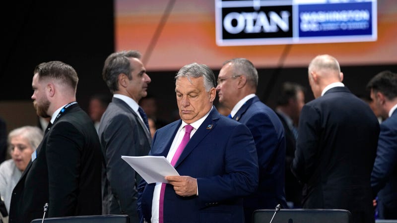 Prime Minister of Hungary Viktor Orban looks over notes during Working Session III of the NATO Summit in Washington, Thursday, July 11, 2024.