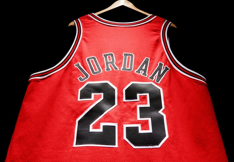 Red Michael Jordan Jersey against a black background