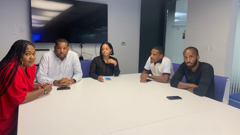 From left: Common Ground Management client Chrystal Bailey, CGM co-founder and CFO Sherman Washington, CGM employee, co-founder and COO Jimmy Burks, co-founder and Executive Director Dominique Landry.