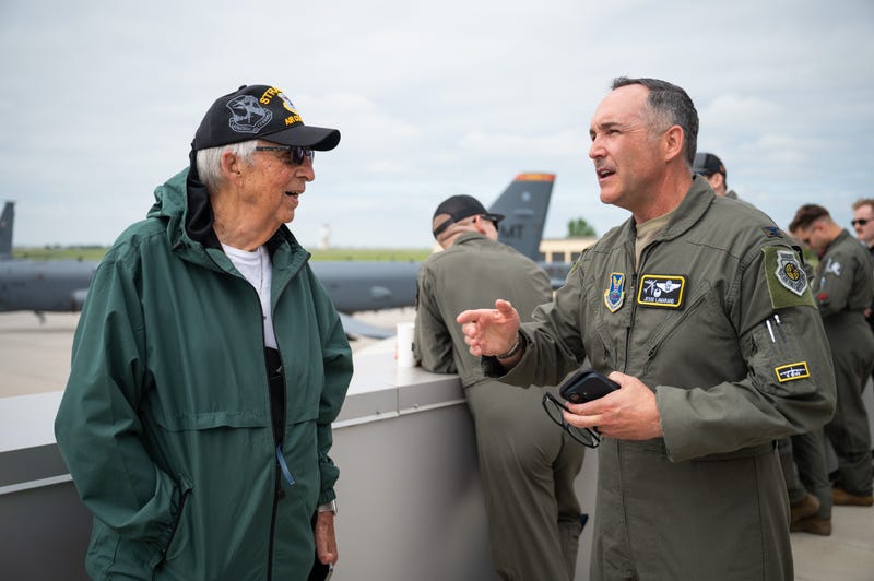 U.S. Air Force Col. Jesse Lamarand (right), 5th Bomb Wing commander, converses with Gary Lee (left), a retired U.S. Air Force pilot, at Minot Air Force Base, North Dakota, June 2025. Lee, 93, traveled north from his home in South Carolina to experience a guided tour at Minot AFB.